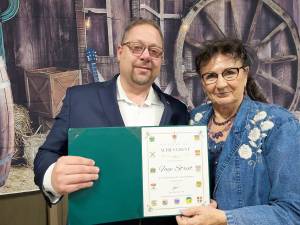 Kootenay-Rockies MLA Pete Davis presents rancher Faye Street with a Lifetime Achievement Award at the Waldo Stockbreeders&rsquo; Association banquet and dance (Submitted)