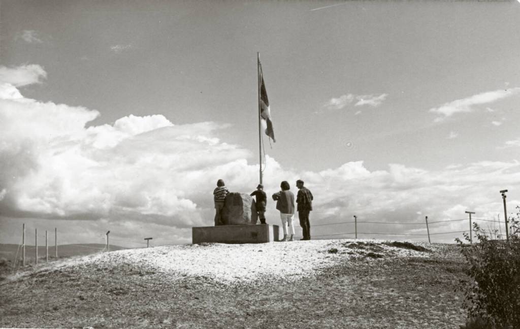 A family stands at the summit of Giant&rsquo;s Head Mountain in this 1969 photograph. The mountain park features a flag, a cairn and a time capsule which was placed during Canada&rsquo;s centennial in 1967. (Summerland Museum and Archives)