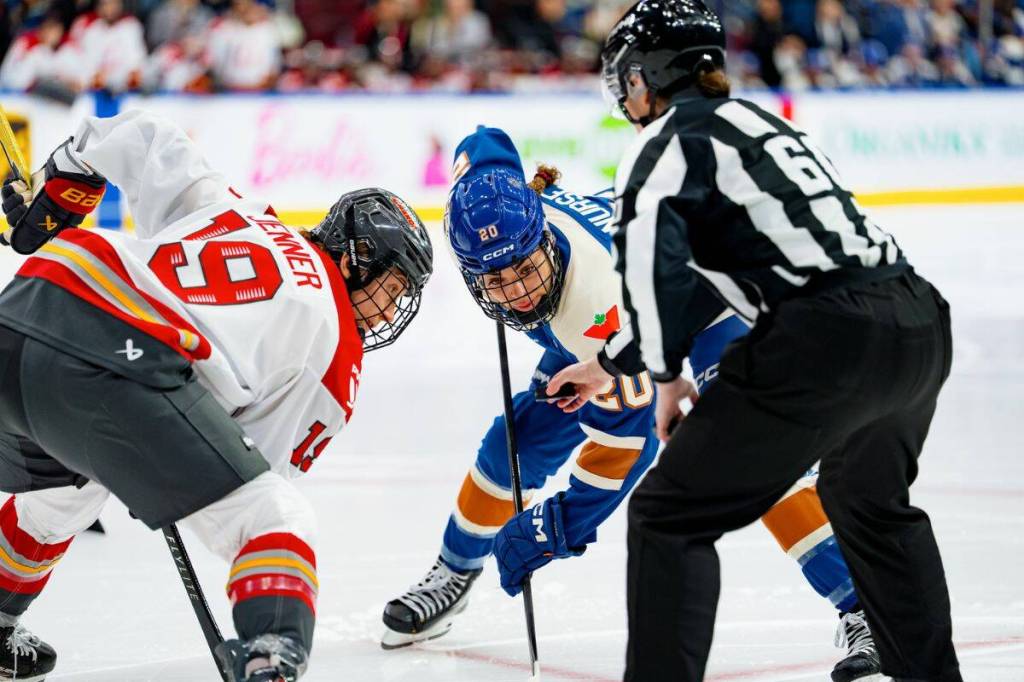 Brianne Jenner, left, and Sarah Nurse during a face-off in the Vancouver Goldeneyes vs the Ottawa Charge game, March 14, 2025, in Vancouver. Nurse scored the first goal for the Goldeneyes midway through the third period. (PWHL)